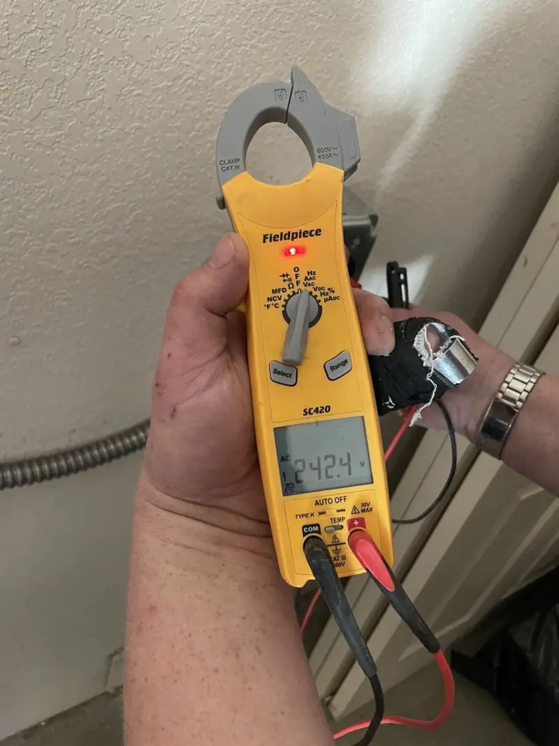 Voltage testing with clamp meter during Hot Tub / Pool Electrical Wiring in Cuba